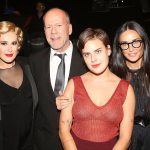 Emma Heming Willis [L], Bruce Willis and Demi Moore [second R] are pictured with his eldest three daughters in 2015