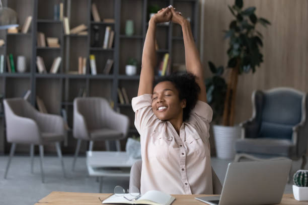 person taking a break to stretch